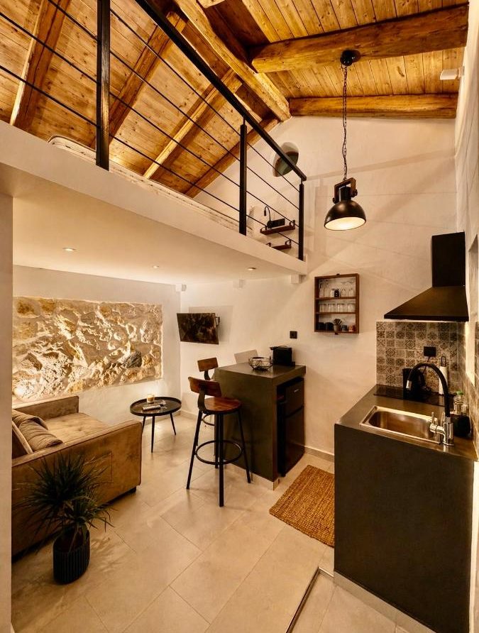 Fully equipped kitchen with sink and countertop